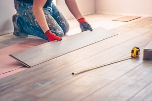 Virginia beach flooring contractor installing LVP